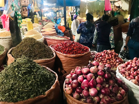 African food market: onions, baobab powder, spices in bags